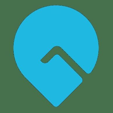 A blue map pin icon with a stylized white checkmark shape inside, set against a light gray background.