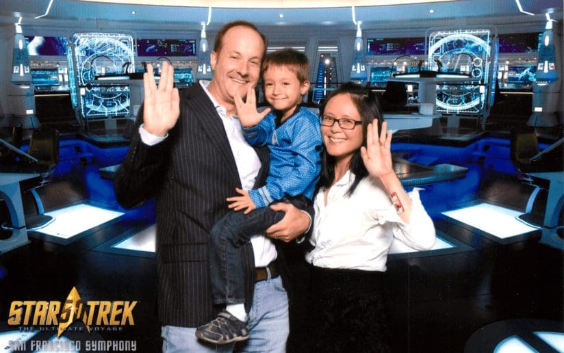 Family posing on a Star Trek set: Dad, child in Starfleet uniform, and Melissa Lin, fashioning a successful marketing career.