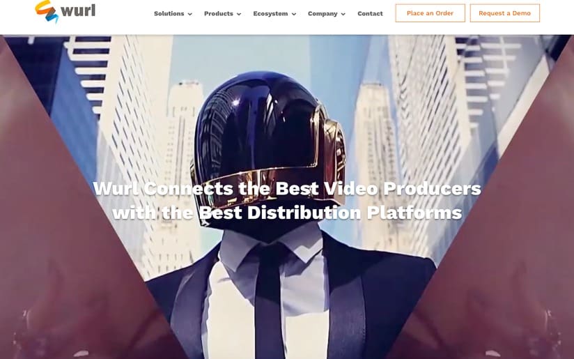 Wurl website homepage featuring a person in a Daft Punk-style helmet. Text: "Wurl Connects the Best Video Producers...