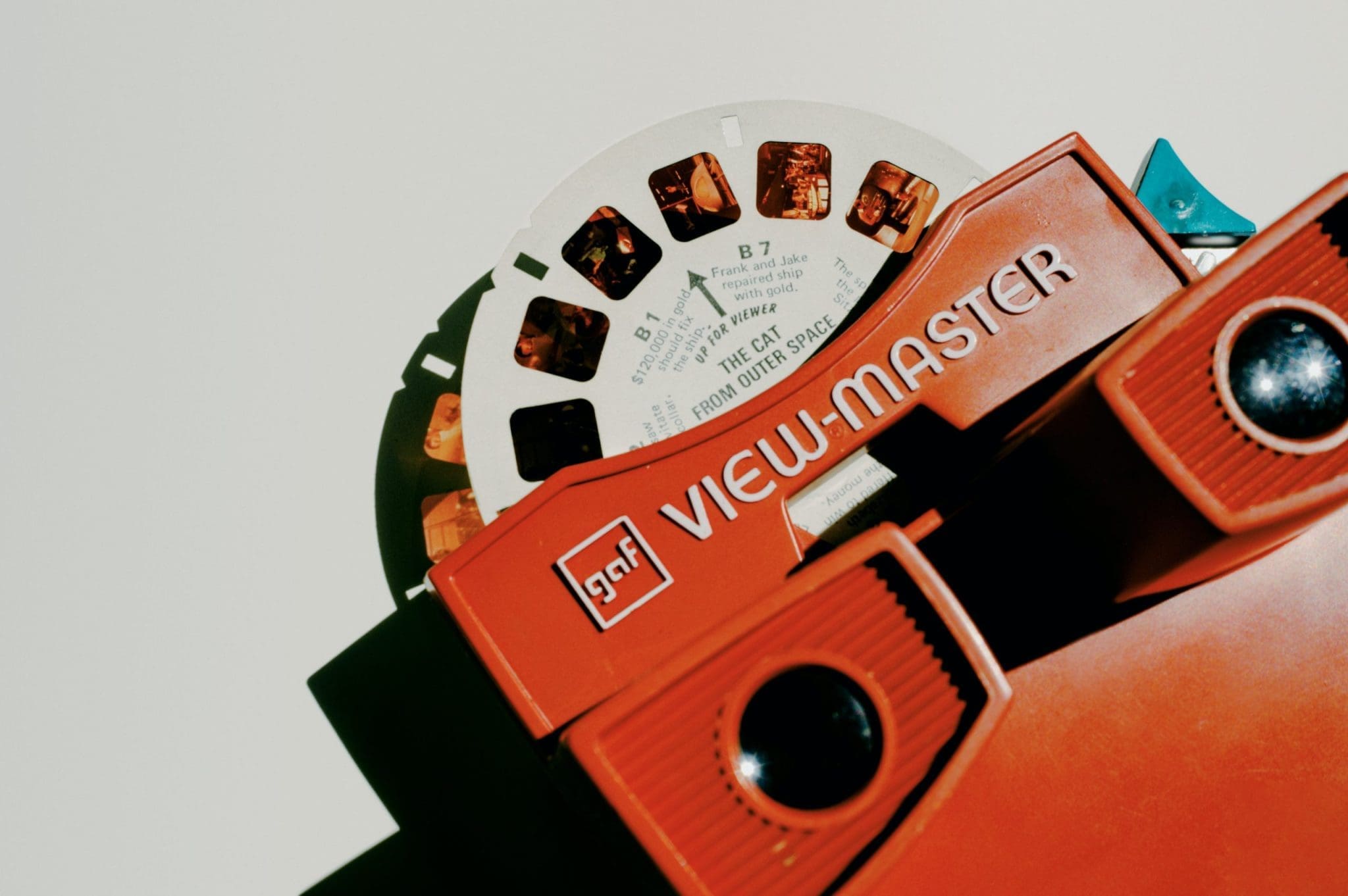 Vintage View-Master with a reel of images, featuring the text THE CAT FROM OUTER SPACE.