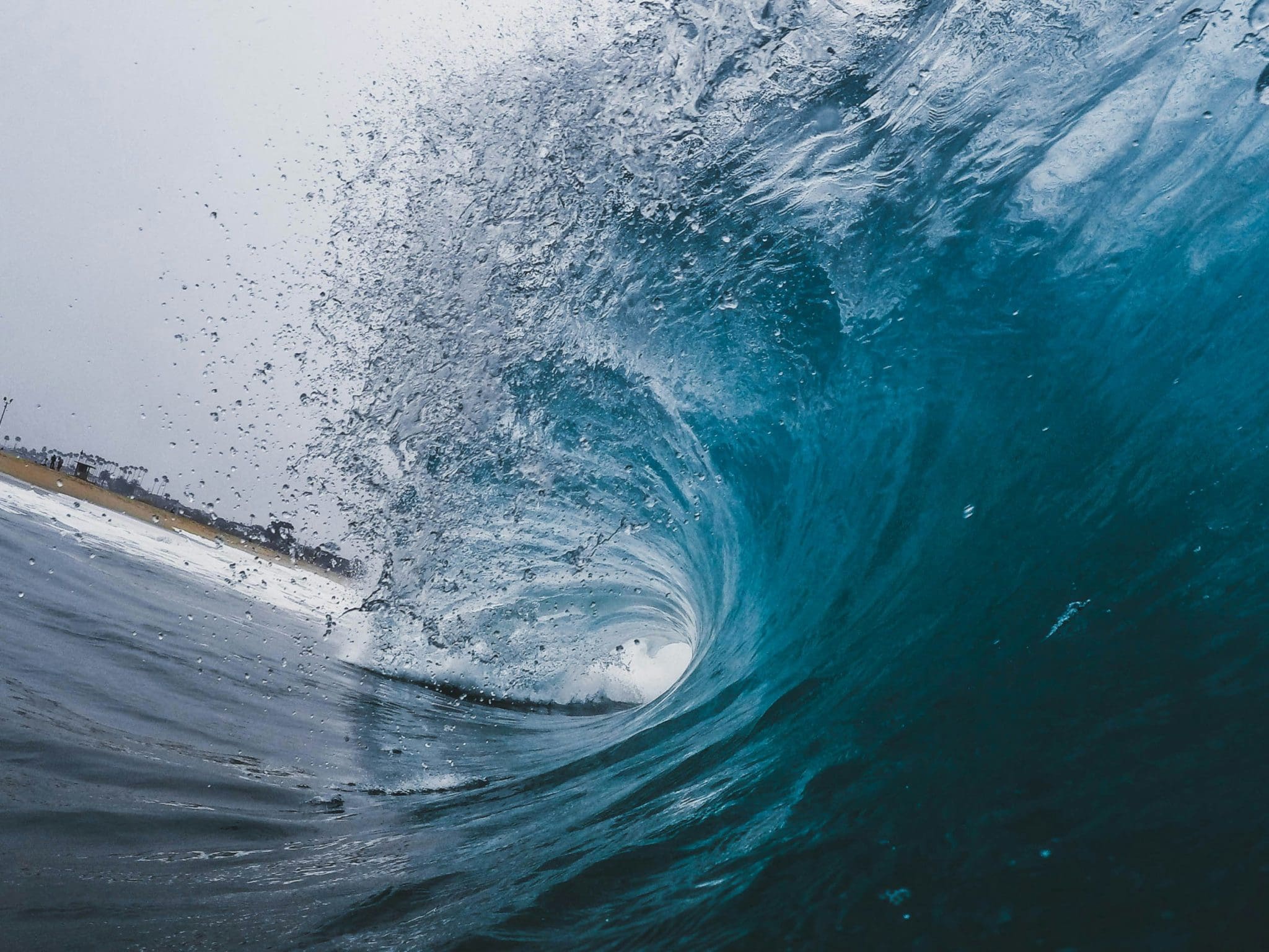 Inside a crashing ocean wave, showing the power of the sea. Perfect for founder mode inspiration.